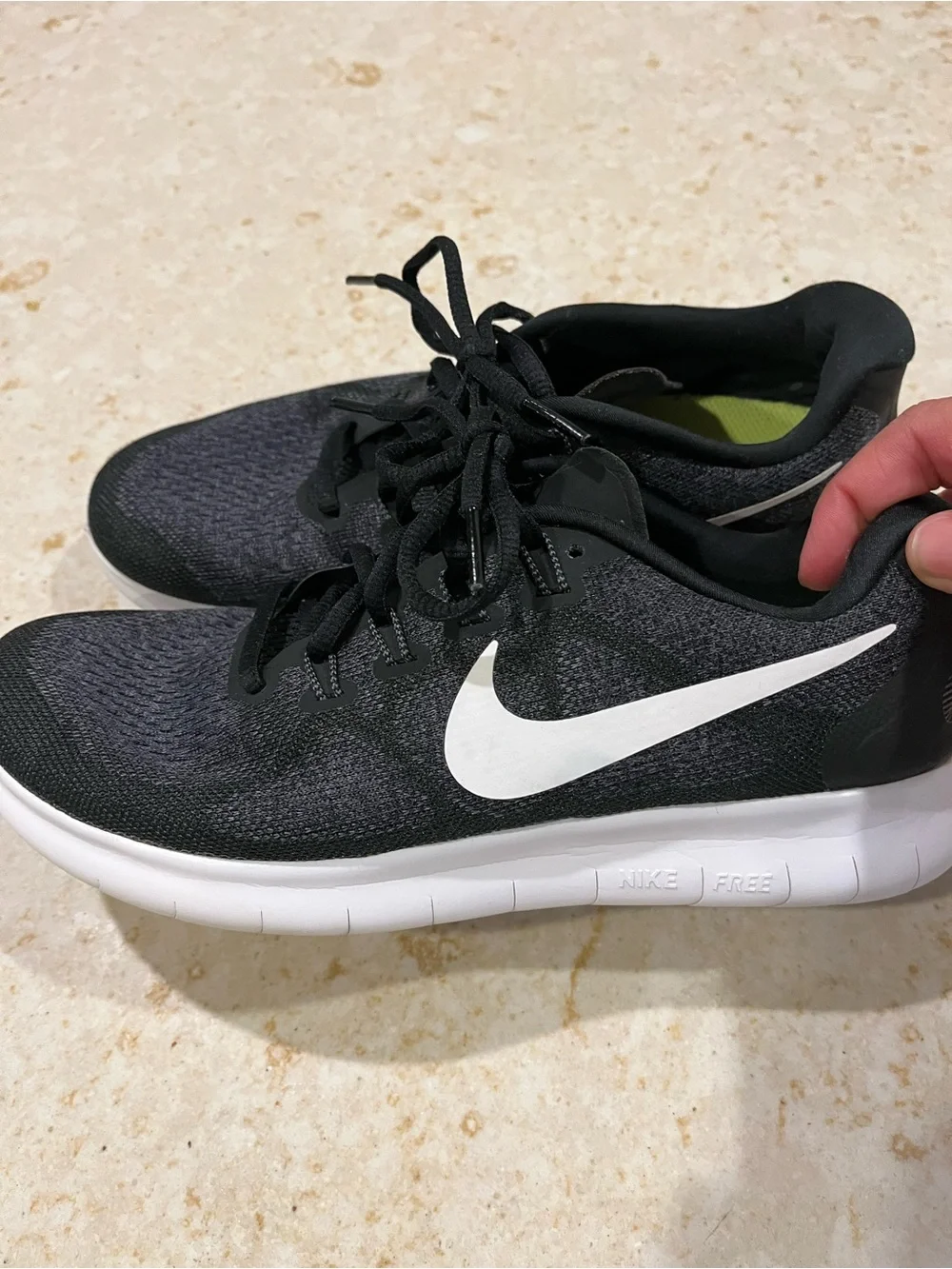Nike free women Black/White Running Shoes with White Swoosh.